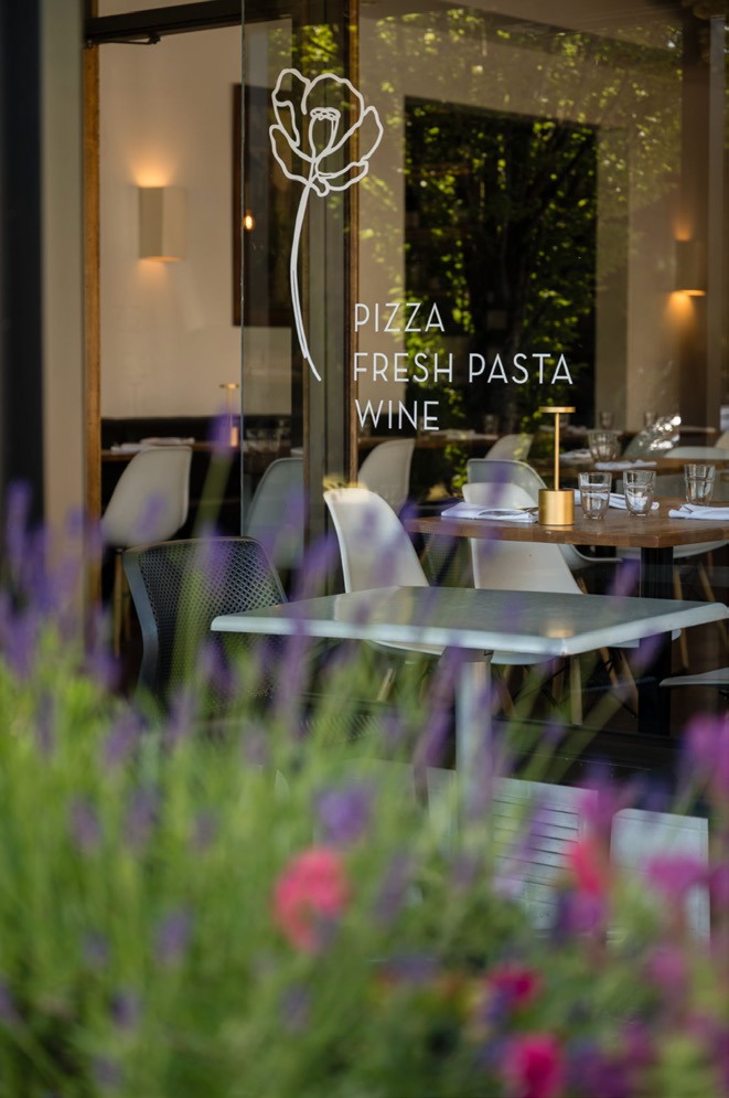A restaurant window in the surrounding West Side neighbourhood.
